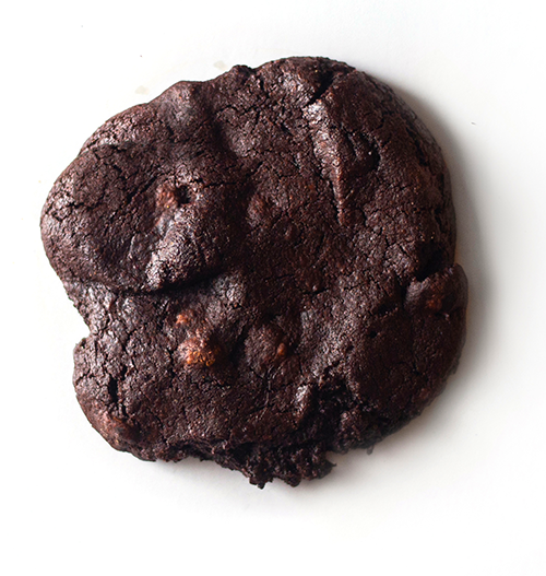 Single brownie cookie gluten free on white background
