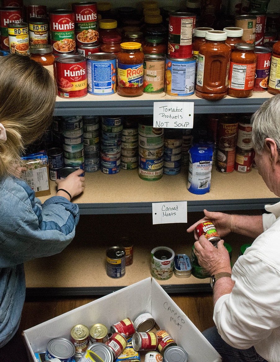 Stocking food pantry shelves
