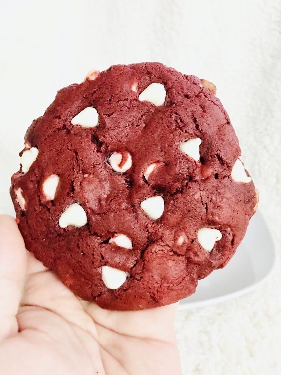 photo of red decadent velvet cookie with white chocolate chips